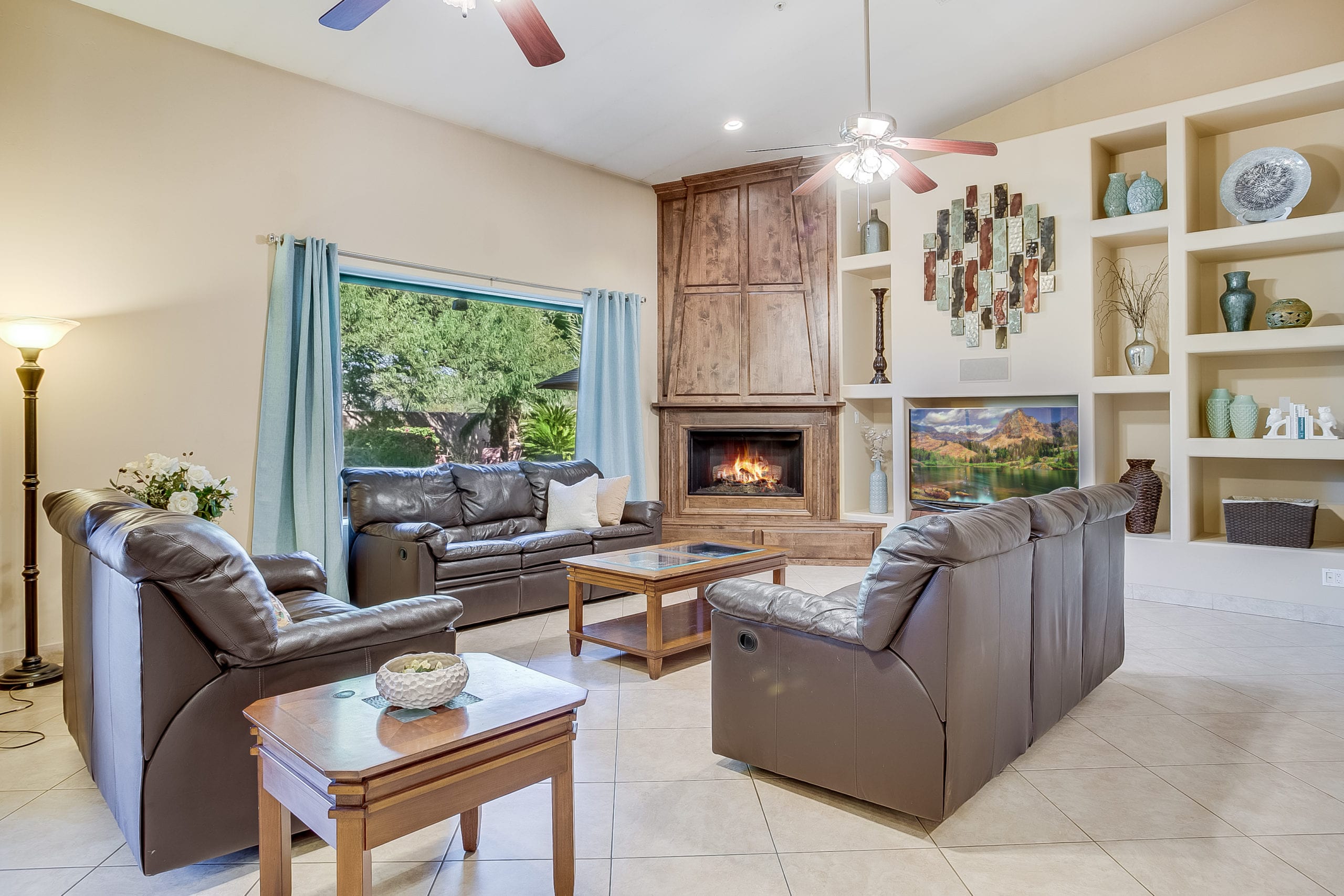 Living Room Fireplace TV and Couches at Whisper Trail Resort